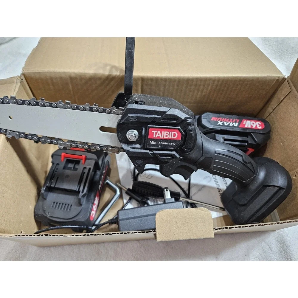 Taibid Mini Chainsaw Hand Held Cordless W Battery Charger Xtra Chain & Instructi